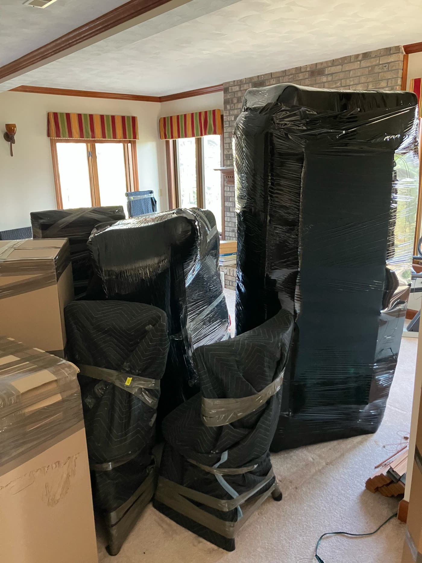 Wrapped furniture at a customer home