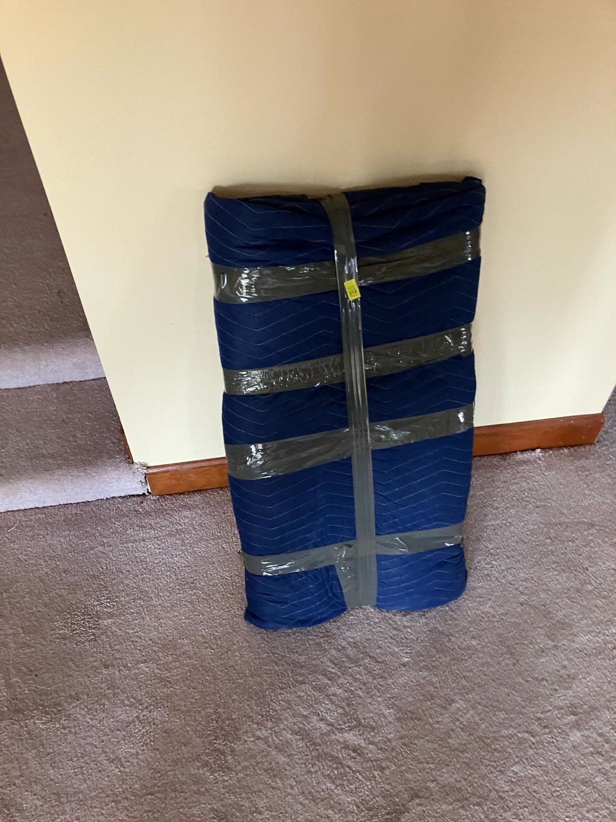 Carefully wrapped tall item