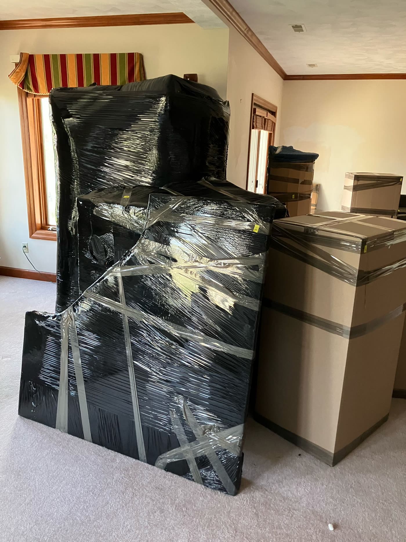 Tall furniture wrapped and prepared